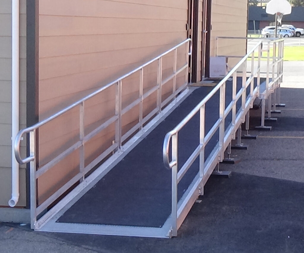 handicap accessible curb ramp railing sidewalk
